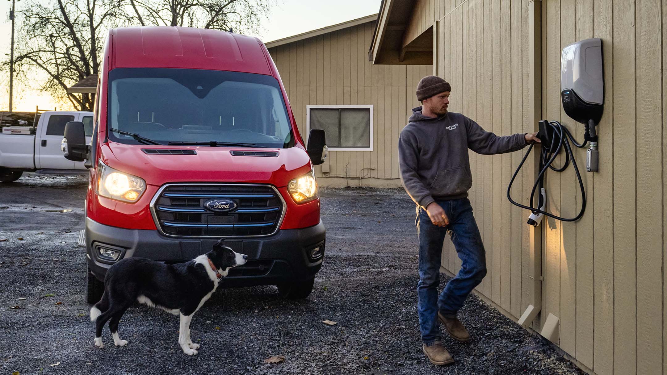 Wallbox Charger red EV behind